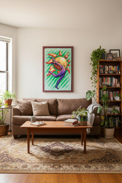 Sun Salutation art print above a tan sofa in a living room besides a bookshelf with a coffee table and rug.