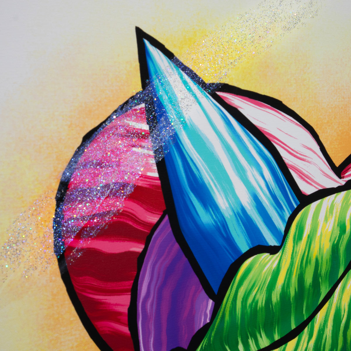 Close-up of Rocket Lips artwork showing glitter accents across a red heart and blue rocket, with purple curves and part of the green lips.